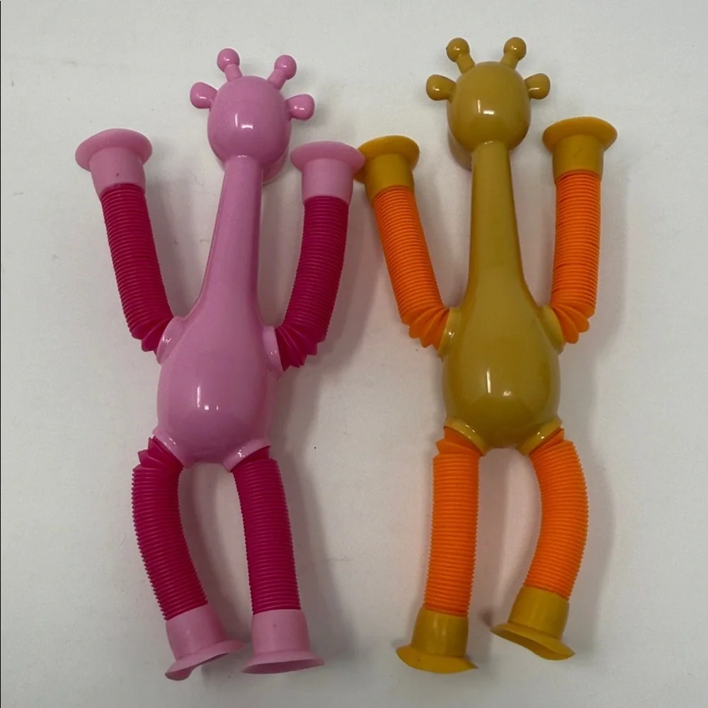 2 Colorful Suction Cup Giraffe Stretch Toys for Kids Pink and Orange NEW No tag